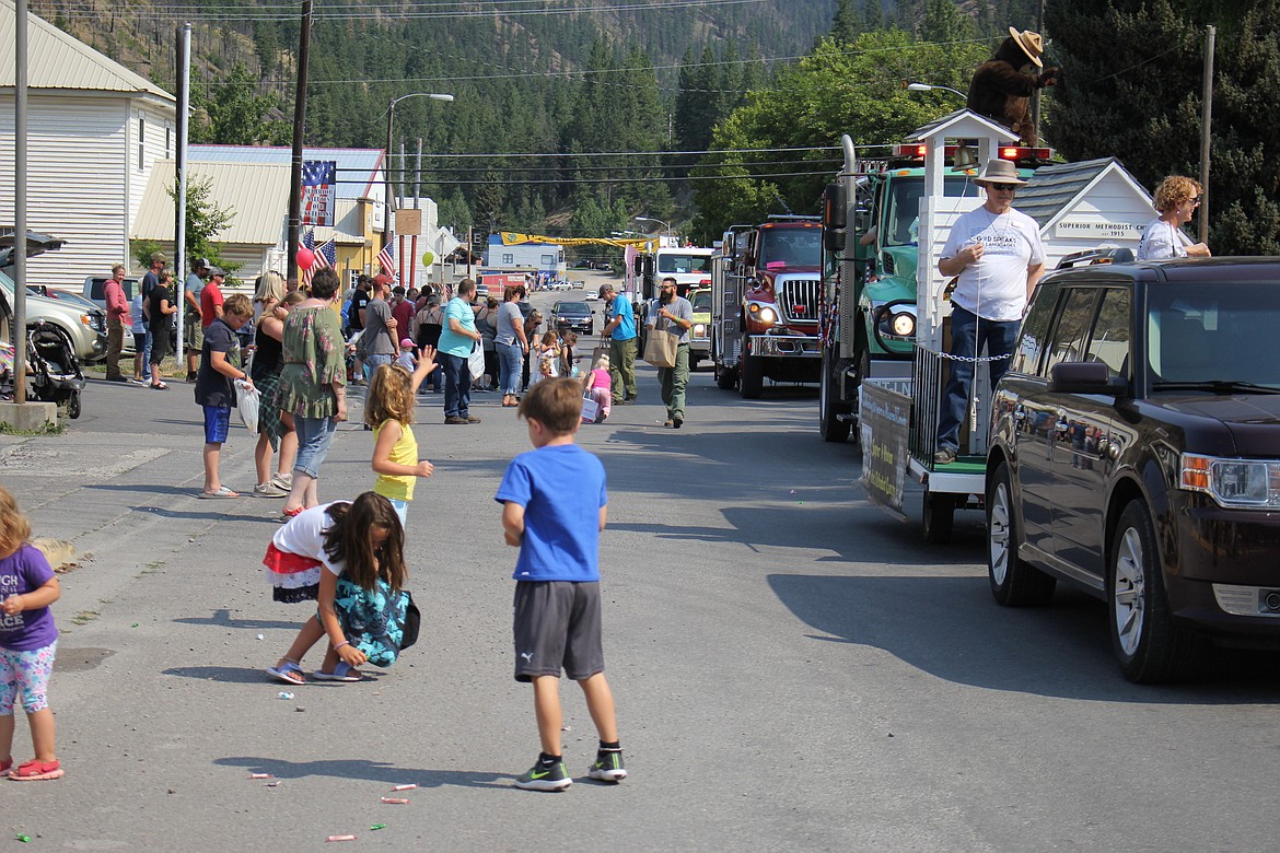 KIDS LINED River Street in Superior to get candy from passing floats during the Mineral County Smokin&#146; Hot Parade on Saturday, Aug. 4.