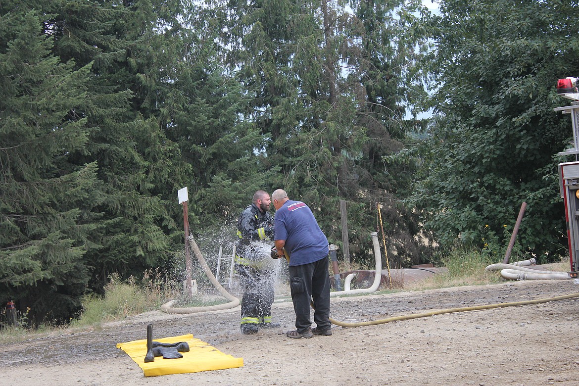 Photo by TANNA YEOUMANS
Everyone got a good hose down after the incident.