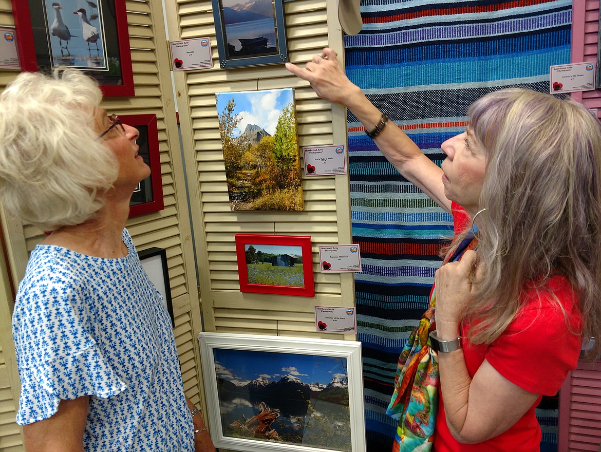 Your first impression when entering the Paradise Center in Paradise is a wall filled with artwork and photographs. The theme works well as the facility serves as a visitor center as well as a community center. (Photos by Joe Sova/Clark Fork Valley Press)