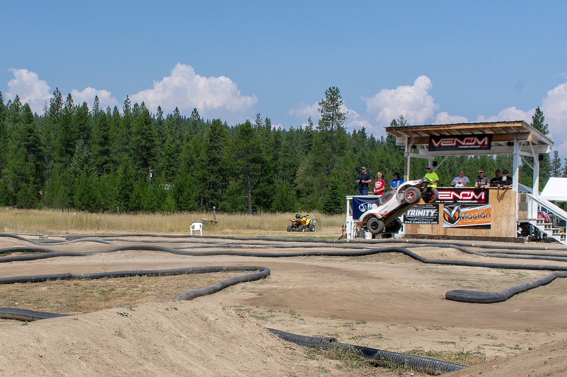 The four wheel drive &#147;truck&#148; RC racer owned by Nathan Goulding comes off a jump during final races of the Kootenai RC Racers&#146; Hot August Showdown on Sunday. (Ben Kibbey/The Western News)