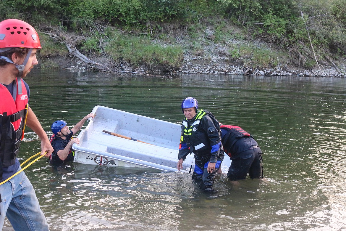 Photo by MANDI BATEMAN
The firefighters were only able to sink the boat once they got it close enough to shore to stand.