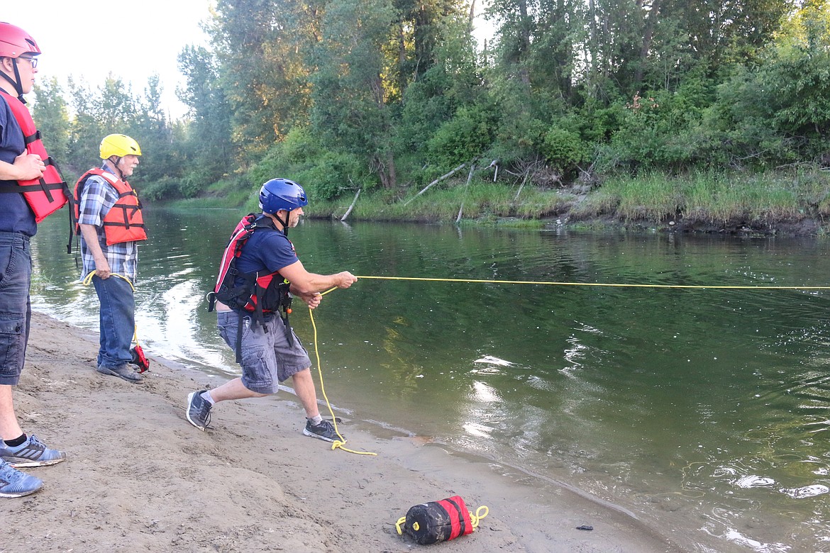 Photo by MANDI BATEMAN
Pulling the mock victim to shore.