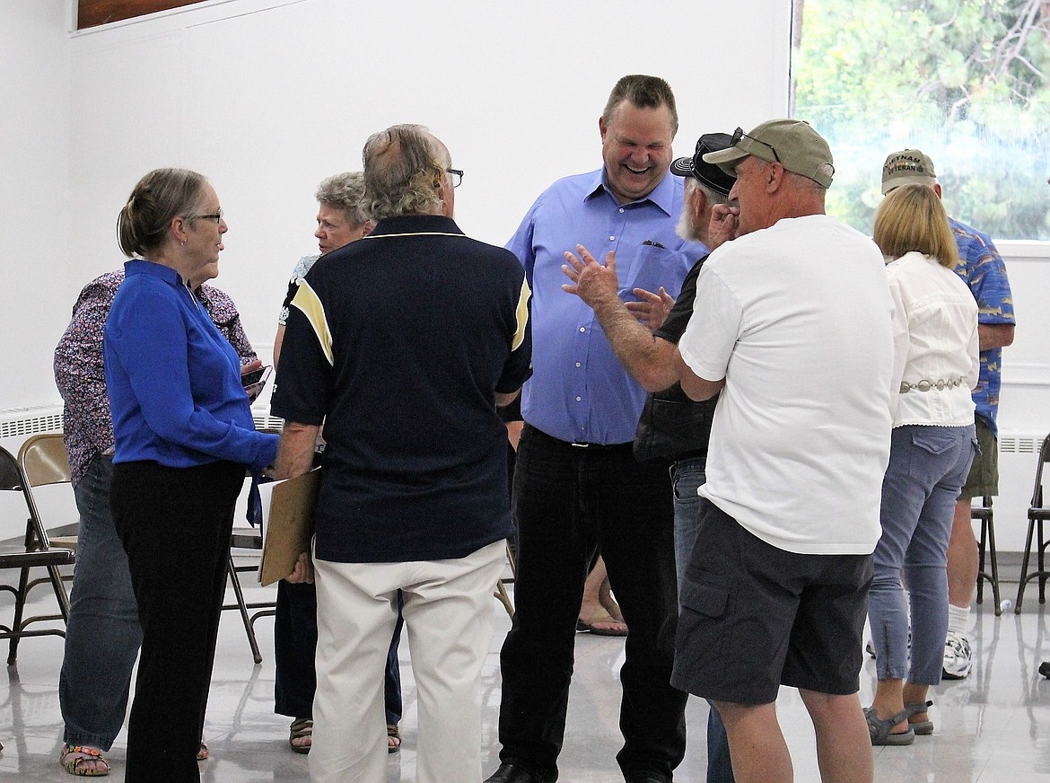 Sen. Jon Tester met with a group of supporters in Superior for an ice cream social after a meeting about infrastructure held at Mineral Community Hospital&#146;s conference room on July 27. (Kathleen Woodford/Mineral Independent)