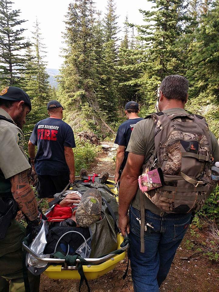 Photo by SANDY STEINHAGEN
Rescuers carried the man from his location to where they met the helicopter.