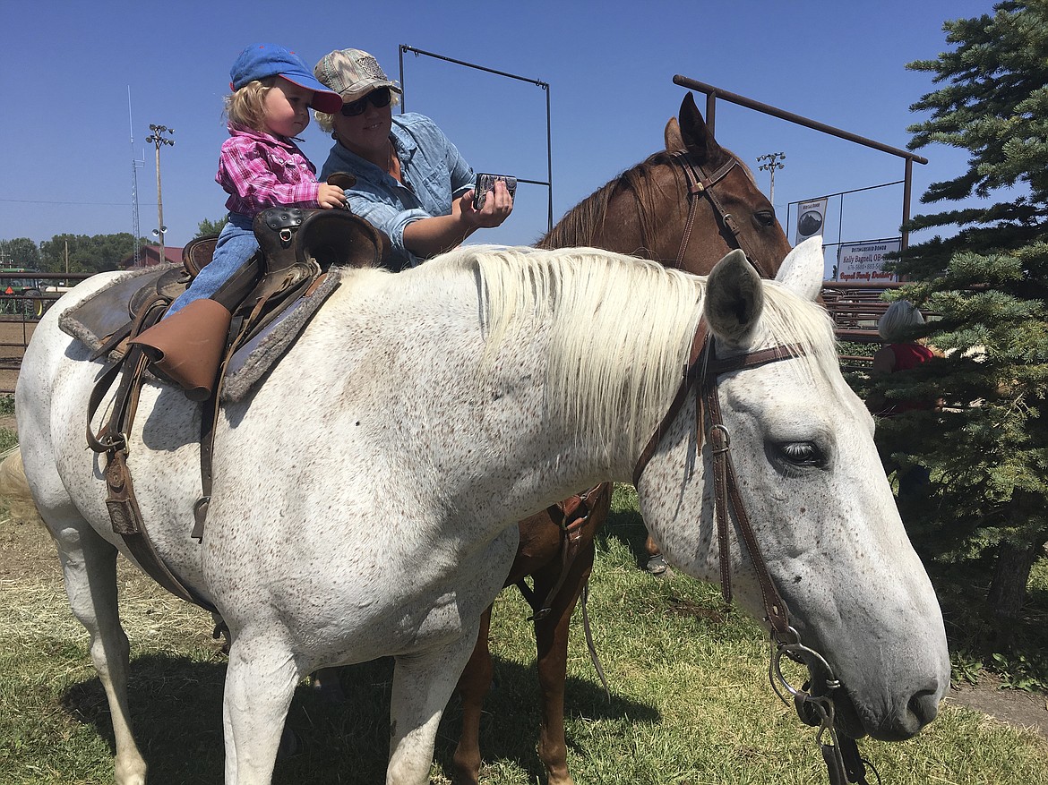 SARAH SENECAL of Pablo takes a selfie with daughter Riley ahead of the toddler&#146;s first barrel race Sunday, July 29. (Ashley Fox/Lake County Leader)