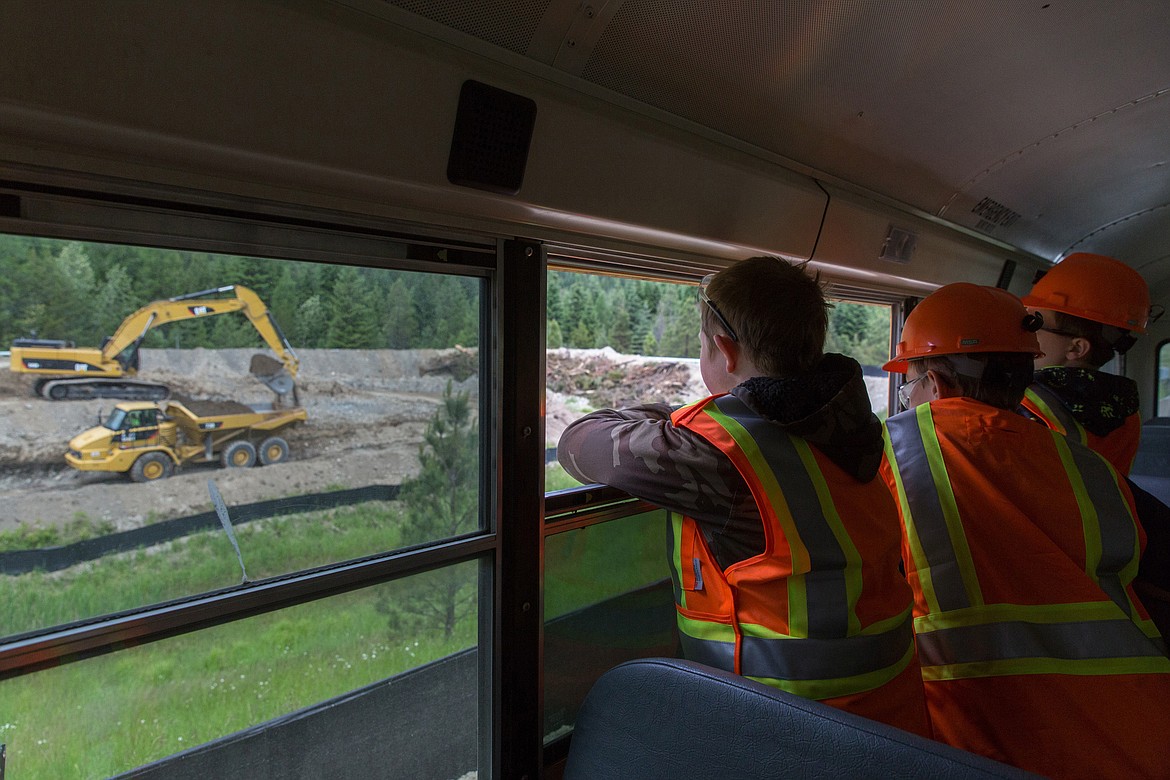 Students from a Troy schools summer science class watch crews do reclamation work at Troy Mine on June 13, 2017. (John Blodgett/The Western News file photo)