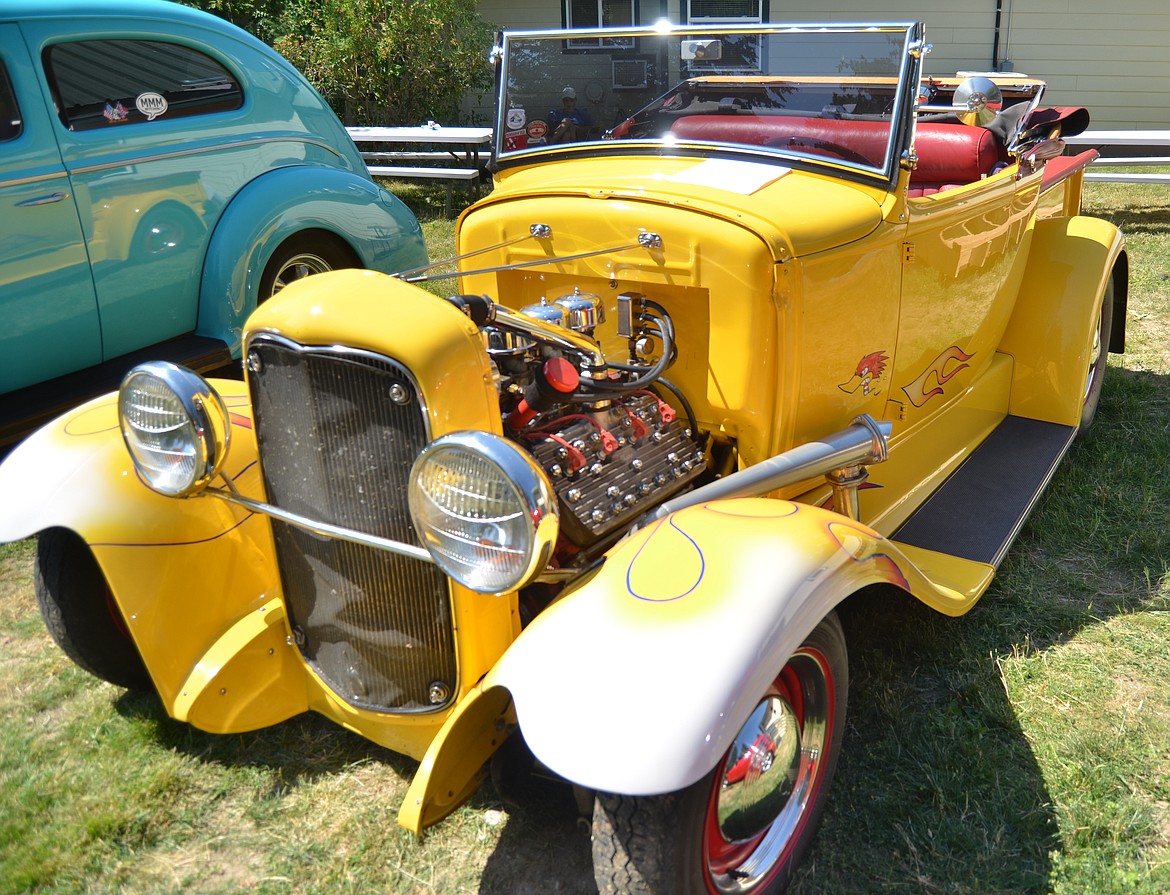 Gary McGraw of Plains had his bright yellow 1931 Ford Roadster Pickup shining under the sun at the car show (Erin Jusseaume/Clark Fork Valley Press)
