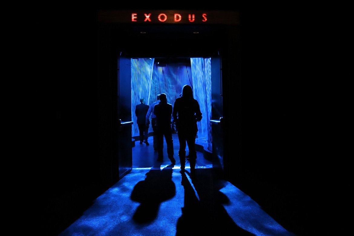 A door opens to the &quot;Exodus&quot; section inside the Museum of the Bible, Monday, Oct. 30, 2017, in Washington. The project is largely funded by the conservative Christian owners of the Hobby Lobby crafts chain. Hobby Lobby president Steve Green says the aim is to educate not evangelize. But skeptics call the project a Christian ministry disguised as a museum. (AP Photo/Jacquelyn Martin)