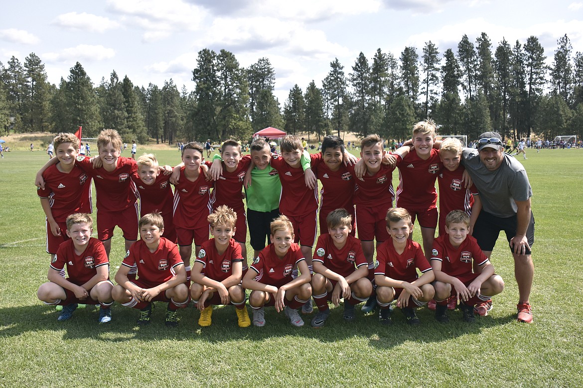 Courtesy photo
Last weekend, Timbers North FC Boys 06 Red participated in the Northwest Cup in Spokane. On Friday afternoon, the Timbers North fell to the Pullman Pumas B06 2-1. Connor Mongan scored the Timbers&#146; lone goal on an assist from Jacob Molina. On Saturday, the Timbers won 2 matches. In the morning, the Timbers beat the Boise Timbers FC 5-0. Connor Jump led the Timbers with 2 goals. Noah Waddell had 1 goal and 1 assist. Jacob Molina and Brayden Ristic each added 1 goal for the Timbers. Kason Pintler and Lachlan May each had 1 assist. In the afternoon, the Timbers beat the Bozeman Blitzz FC Blue 2-0. Connor Jump and Brayden Ristic each had 1 goal for the Timbers. Kason Pintler and Gavin Samayoa each had 1 assist. Braden Latscha was in goal for both Timbers shutout wins. On Sunday morning, the Timbers lost a semifinal match to the Spokane Sounders Rave 3-1. Connor Mongan scored the Timbers&#146; lone goal on an assist from Jacob Molina. In the front row from left are Connor Jump, Brayden Ristic, Max Cervi-Skinner, Zack Cervi-Skinner, Aidan Rice, Lachlan May, Connor Mongan; and back row from left, Gavin Samayoa, Jacob Molina, Haidyn Jonas, Kason Pintler, Noah Waddell, Braden Latscha, Ben Hannigan-Luther, Chief Natatqn Allan, Kia Delio, Max Entzi, Harper Barlow and coach Nick Funkhouser.