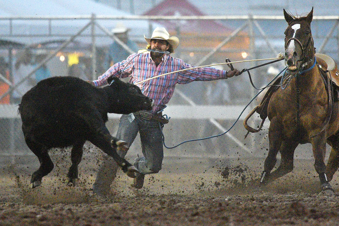 Jade Gardner, of Winnett, competes during the Steer Wrestling event at the Northwest Montana Fair and Rodeo on Thursday. (Casey Kreider/Daily Inter Lake)