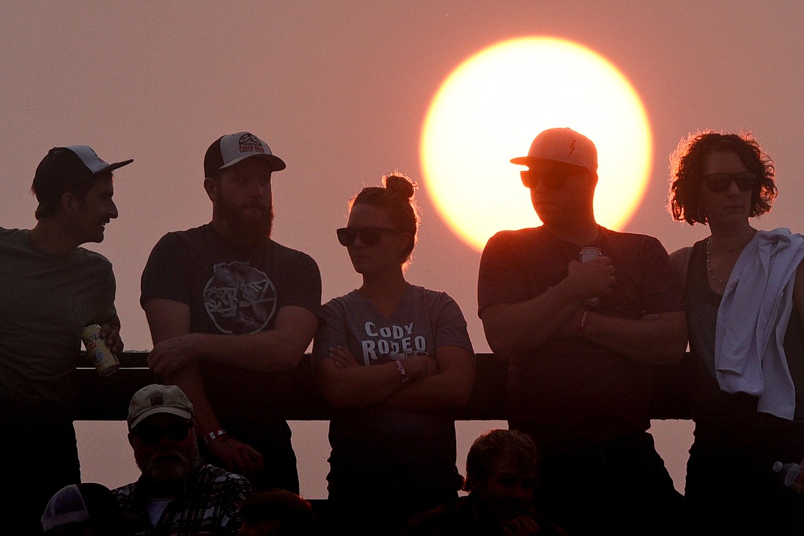 Fans watch from the top of the grand stand at the Northwest Montana Fair PRCA Rodeo on Saturday evening at the Flathead County Fairgrounds. (Casey Kreider/Daily Inter Lake)