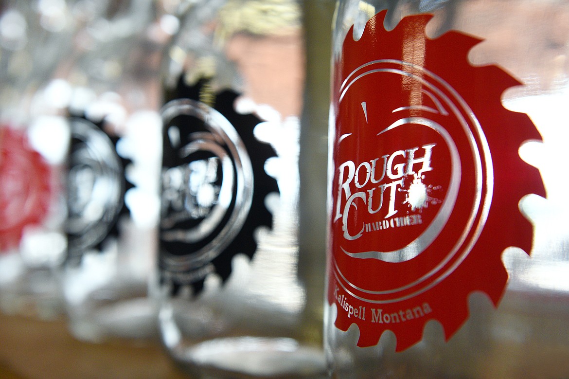 Growlers along a windowsill at Rough Cut Hard Cider on Thursday, July 26. (Casey Kreider/Daily Inter Lake)