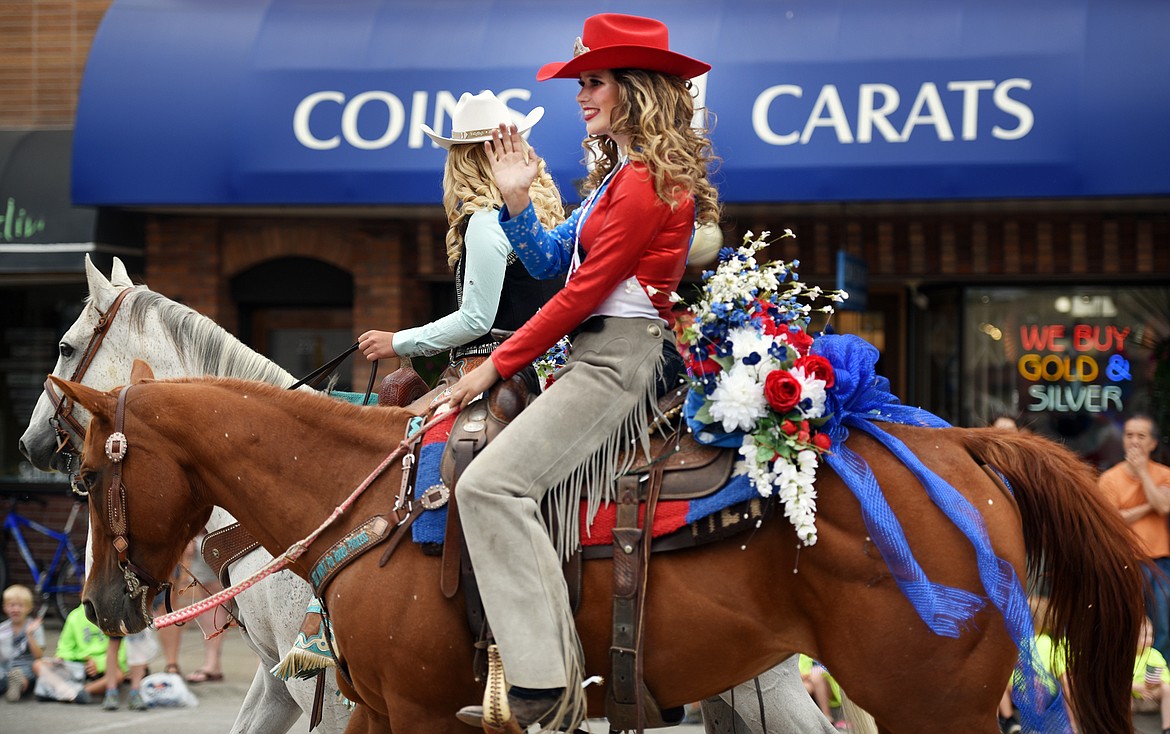 Rodeo royalty ride in the annual Northwest Montana Fair Parade. This year the parade was the largest ever with more than 90 entries.