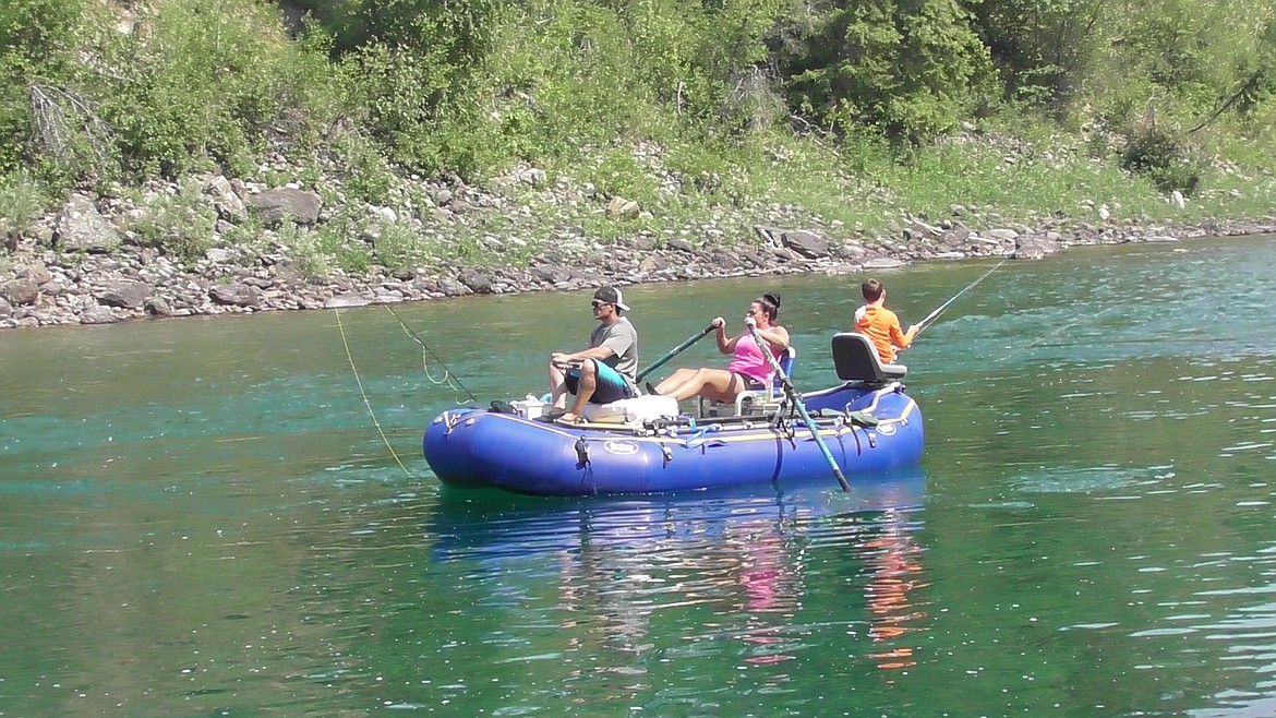 Rafters fish along at section of the Middle Fork of the Flathead. The river is a stronghold for native westslope cutthroat trout.