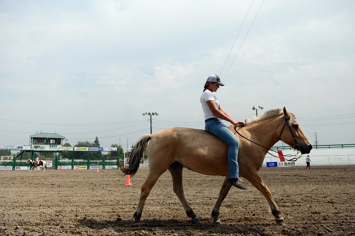 Bethany Emper rides her Fjord during the draft horse show at the Northwest Montana Fair and Rodeo on Thursday. (Casey Kreider/Daily Inter Lake)