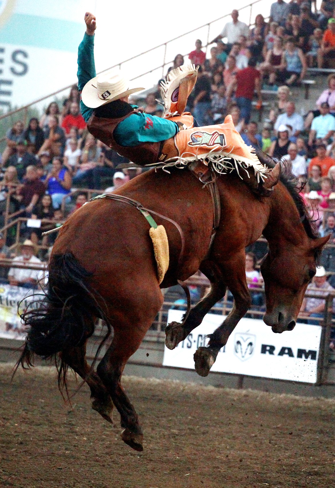 Rodney Harwood/Columbia Basin HeraldRekker takes No. 5 in the PRCA/Wrangler world standings Jake Brown into the air during his ride in the bareback competition at the 75th annual Moses Lake Roundup.