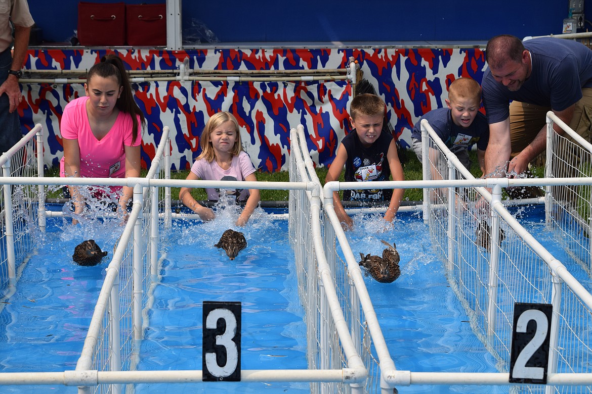 Charles H. Featherstone/Columbia Basin Herald
Kids racing ducks at the Grant County Fair.