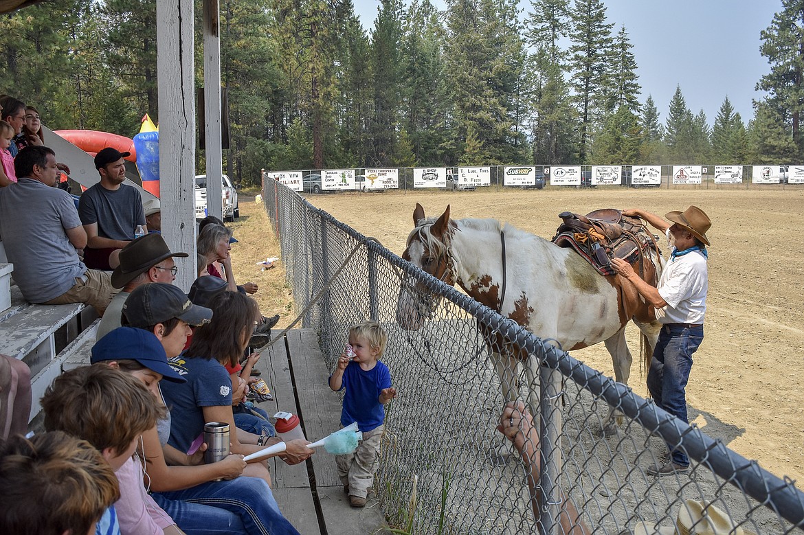 Gib Stovall talks with the crowd about the withers &#151; the ridge between the horse&#146;s shoulder blades &#151; and proper saddle fitting during the Three Lakes Roundup put on by Three Lakes Church outside Troy on Saturday. (Ben Kibbey/The Western News)