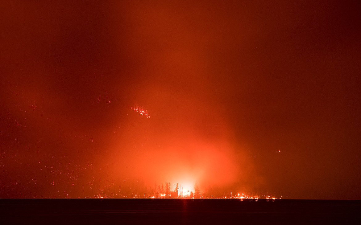 The Howe Ridge Fire burns on the north end of Lake McDonald Sunday evening (Chris Peterson photo)