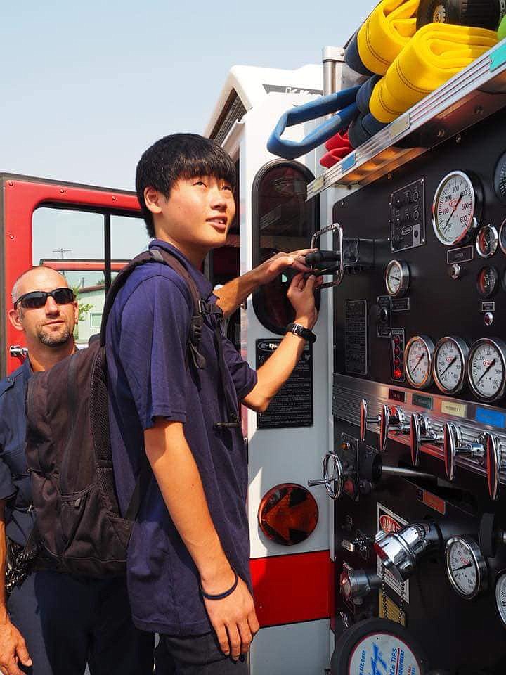 Moses Lake-Yonezawa Sister City Exchange Program/courtesy photo
Exchange students from Yonezawa got up close and personal with firefighting equipment during a tour of the Moses Lake Fire Department.