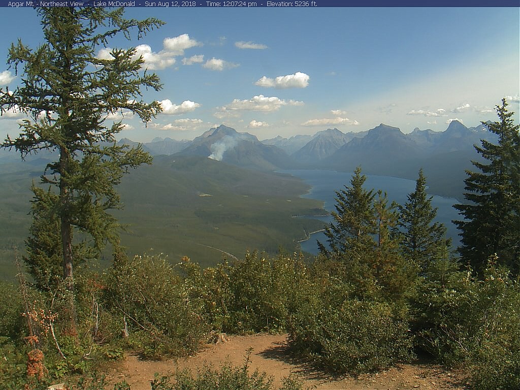 Smoke from a wildfire burning along Lake McDonald in Glacier National Park is seen in the webcam shot from Sunday morning. (NPS webcam)