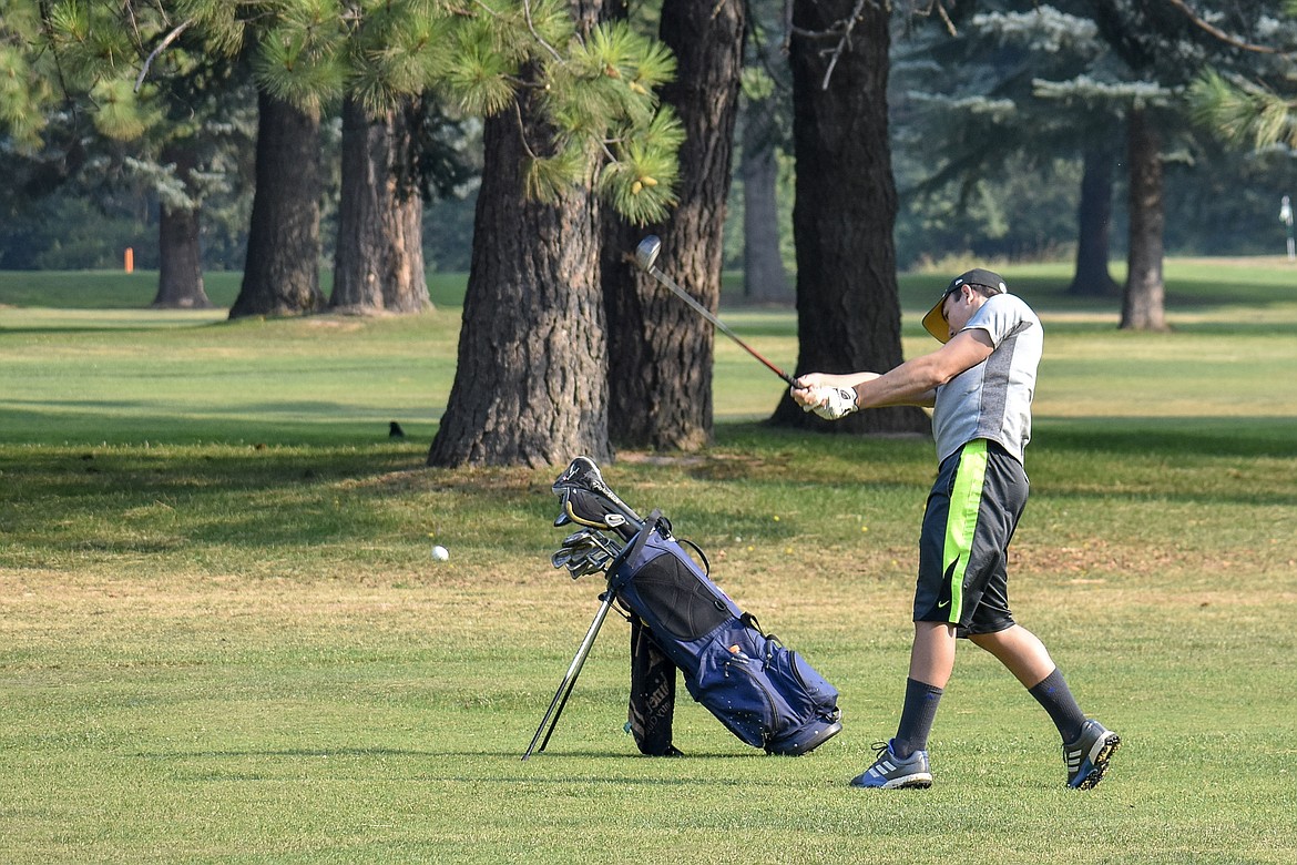 Junior Trey Thompson drives on the first hole at Cabinet View Golf Club Friday during the Loggers&#146; first morning practice. (Ben Kibbey/The Western News)