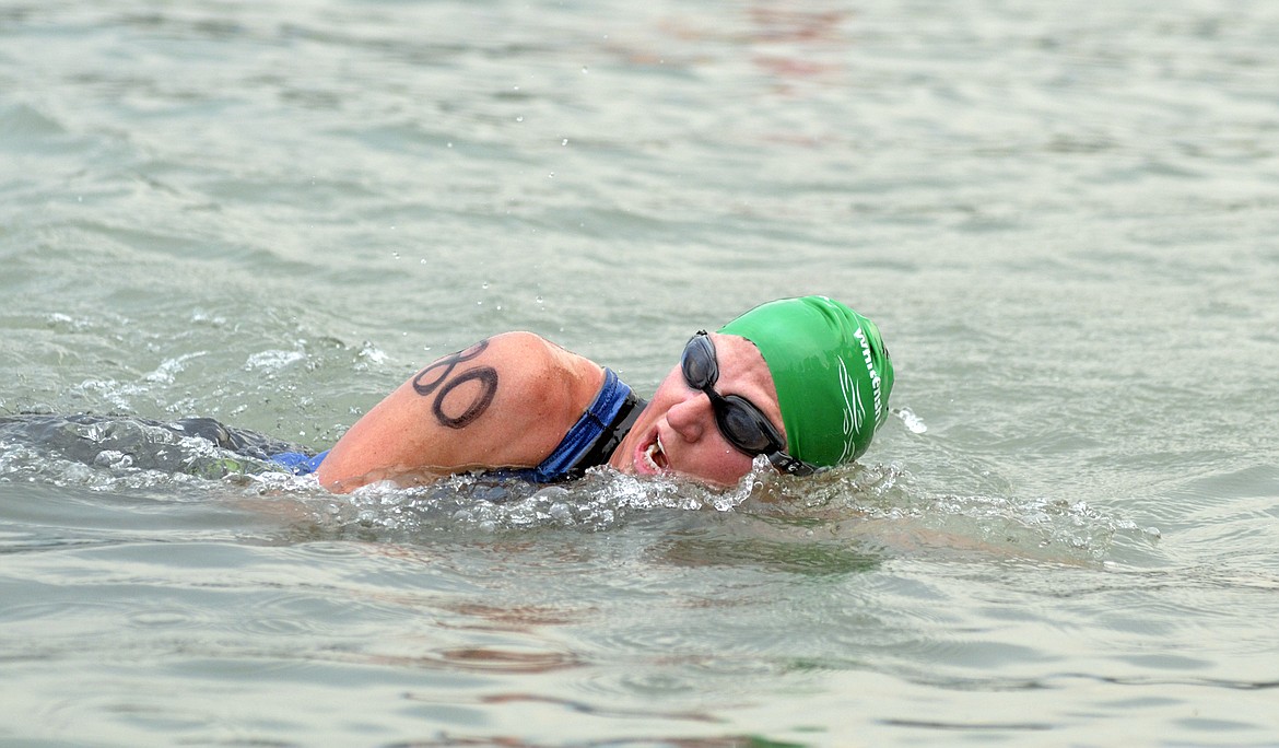 A swimmer competes in the Whitefish Lake Swim.