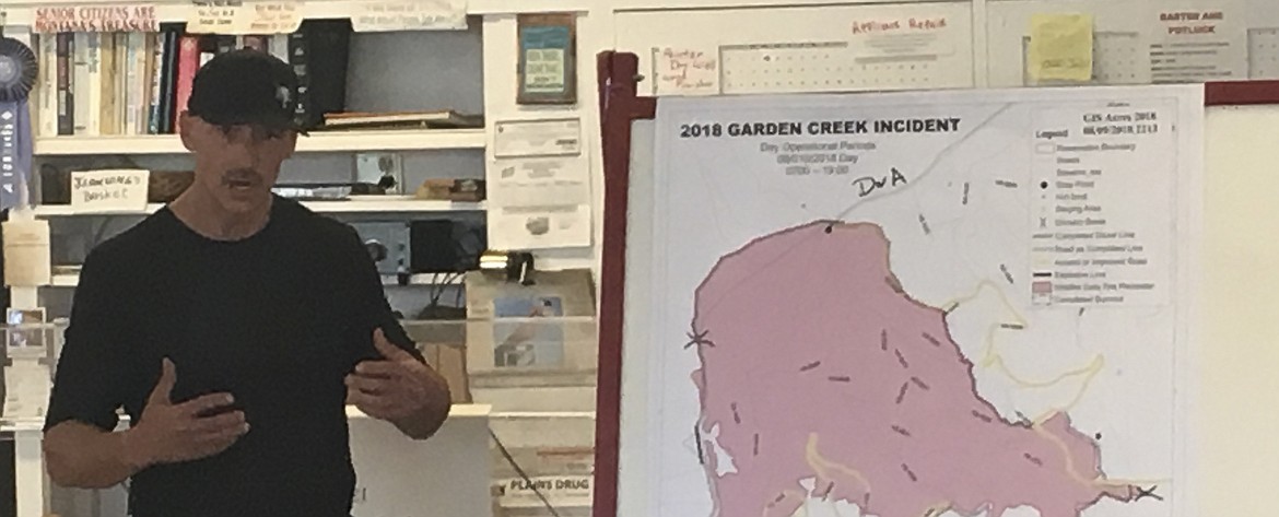 FIRE MANAGEMENT Officer Ron Swaney with The Confederated Salish and Kootenai Tribes Division of Fire shares updates with Hot Springs residents about the Garden Creek Fire. The blaze is located about two miles north of Hot Springs. (Ashley Fox/Lake County Leader)