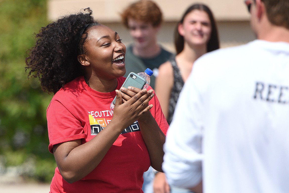Courtney Tensley, with Ignite Nation, works with a group of Flathead High School students on Wednesday, Aug. 8. The students are learning different lessons to incorporate as they mentor freshman. (Casey Kreider/Daily Inter Lake)