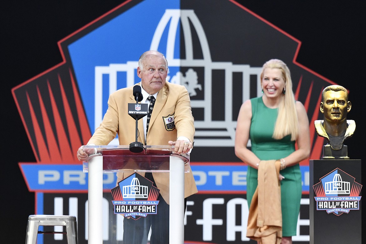 Former NFL player Jerry Kramer delivers his speech beside his presenter, daughter Alicia Kramer, during inductions at the Pro Football Hall of Fame on Saturday, Aug. 4, 2018, in Canton, Ohio. (AP Photo/David Richard)