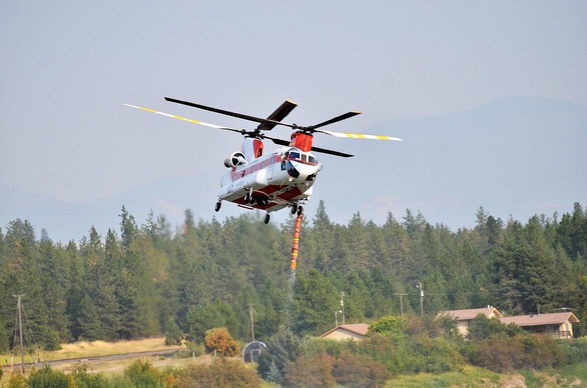 The Chinook Helicopter joined in the efforts for air attaack on the Weeksville fire. (Erin Jusseaume/Clark Fork Valley Press)