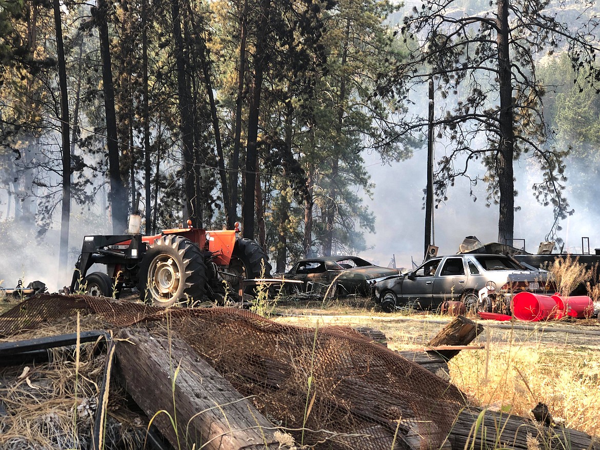 The Weeskville fire started at the back of the main house. A single-wide mobile home, propane tank and two garden shed were lost, and this was all that was left. (Erin Jusseaume/Clark Fork Valley Press)