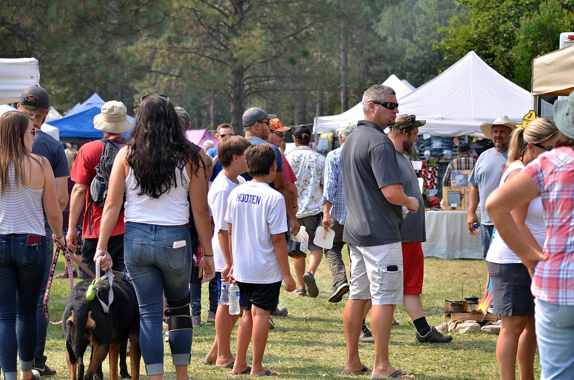 Crowds flocked through the gates of the Huckleberry Festival on Saturday. (Erin Jusseaume/ Clark Fork Valley Press)
