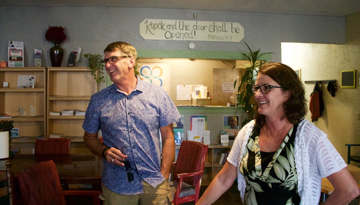 Gar and Vicki Mickelson enjoy greeting people at 2nd Street Commons. (Photo by David Humphreys)