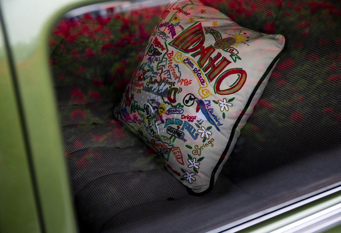 Herb and Corrinne Hammermeister bought this pillow form the Coeur d'Alene Resort Gift Shop on Thursday. It was later placed inside their 1948 Packard Delux Eight, a car gifted by their son James. (LOREN BENOIT/Press)