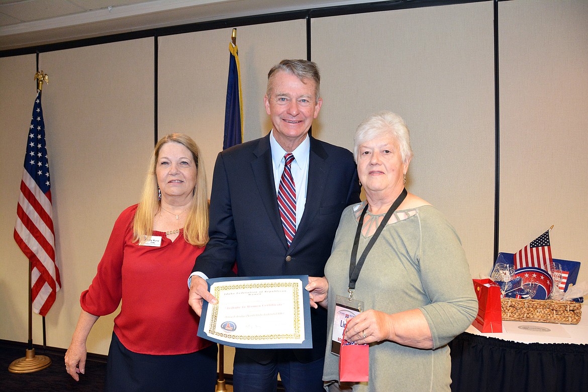 (Courtesy photo)
Idaho Federated Republican Women President Kitty Kunz, left, and Linda Alt, of Bonners Ferry, right, accept the Tribute to Women Award for Jenise Eskridge, from Idaho Lt. Gov. Brad Little. Eskridge was unable to attend IFRW&#146;s Tribute to Women Breakfast where the award was presented.