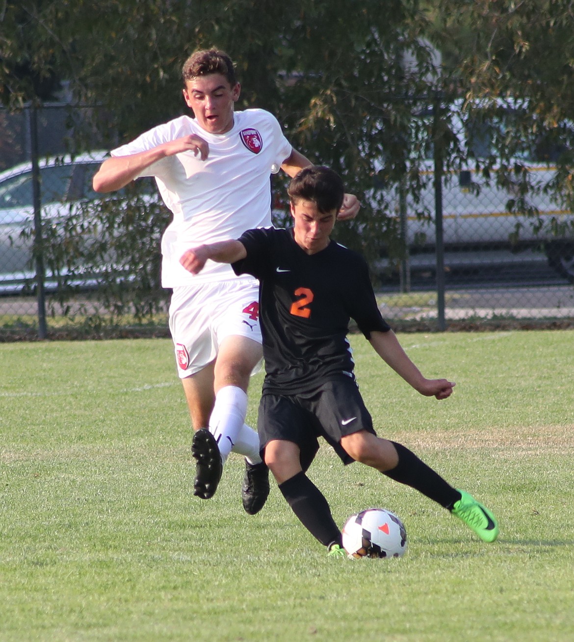 (Photo by ERIC PLUMMER)
At 6-foot-4, senior Dylan Baillie, left, is a commanding presence on the soccer field, using strong leaping ability to consistently win challenges in the air.