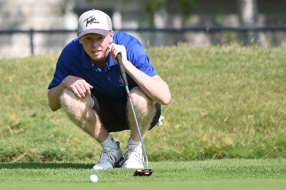 Libby's Ryggs Johnston lines up a putt on the 11th hole of Whitefish Lake Golf Club's North Course during the Whitefish Invitational on Wednesday. (Casey Kreider/Daily Inter Lake)