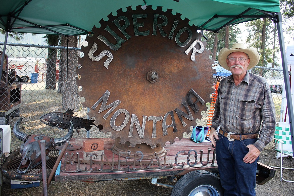Scrap metal artist Dennis Althoff stands by part of a 16-foot-tall statue that will be installed on the Mineral County Courthouse lawn in Superior. The Ore to Oar historical art project is currently raising funds to complete the project by selling engraved bricks that will surround the statue. (Kathleen Woodford/Mineral Independent)