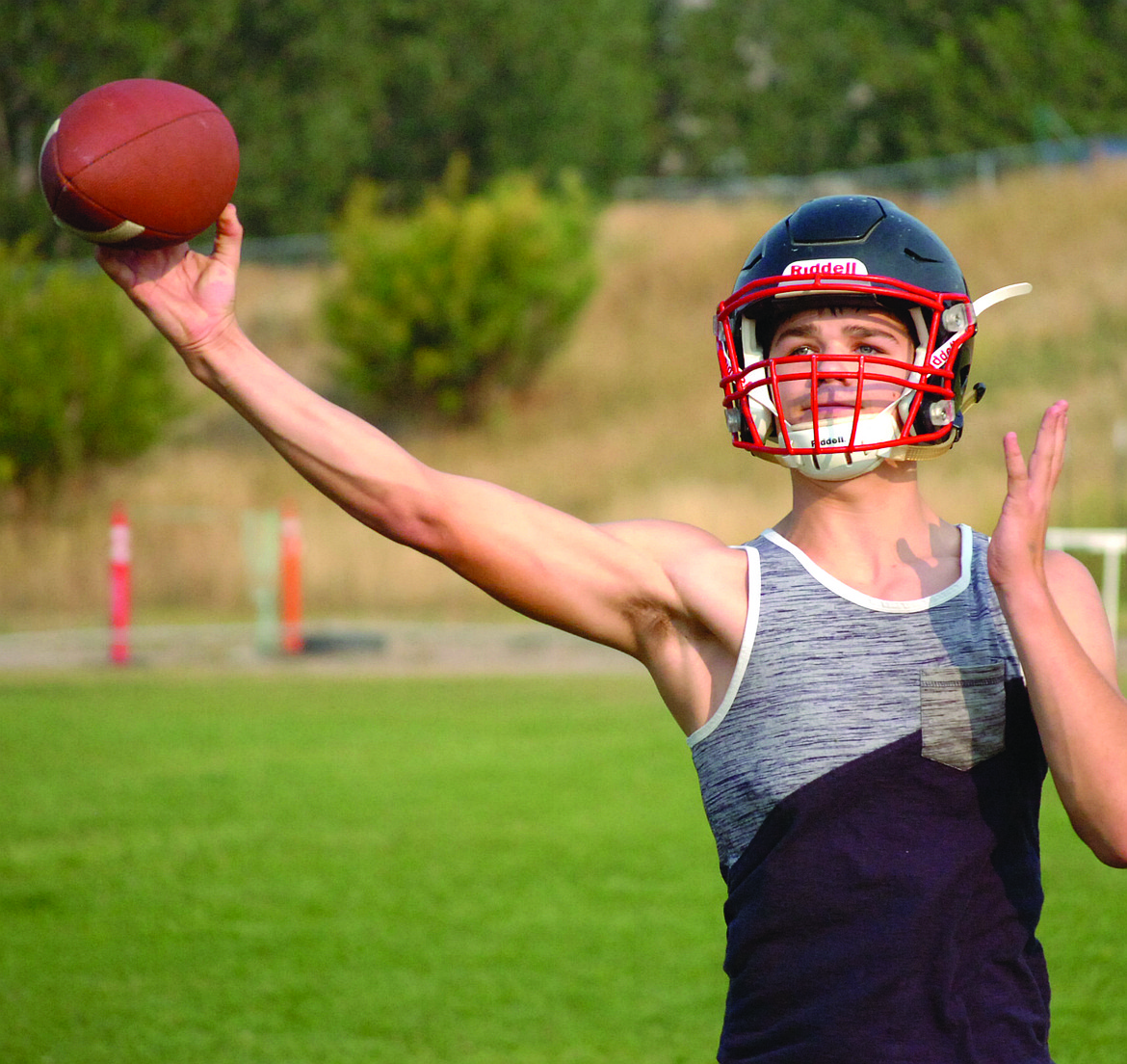 Plains junior quarterback Brandon Knudsen rifles a pass during a practice drill on Saturday morning, Aug. 18. Knudsen is expected to split QB duties with freshman Jack McAllister as Knudsen is adept at playing other positions on offense. (Joe Sova photos/Clark Fork Valley Press)