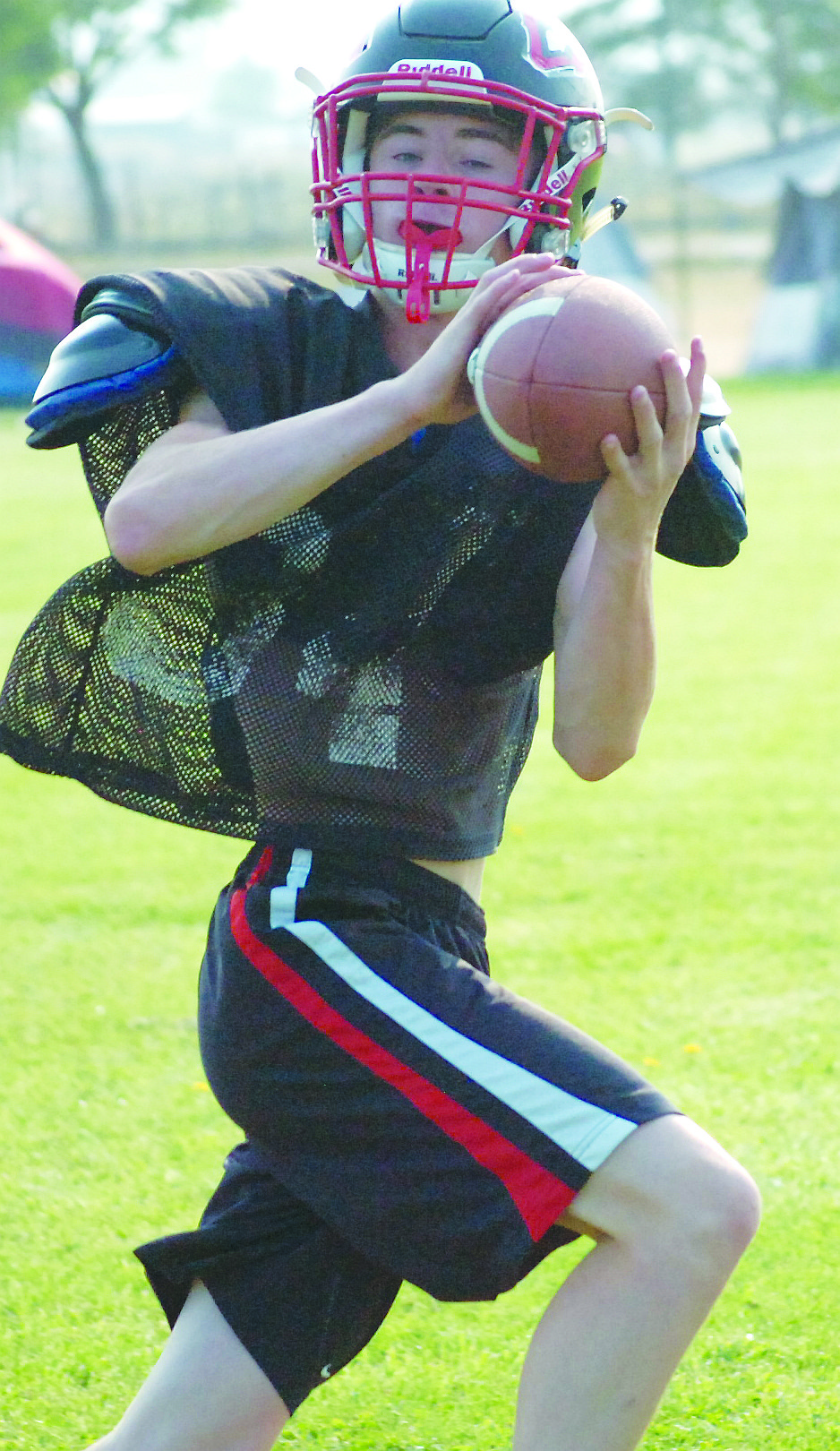 Kyle Lawson snags a pass during a Horsemen practice last Saturday in Plains.