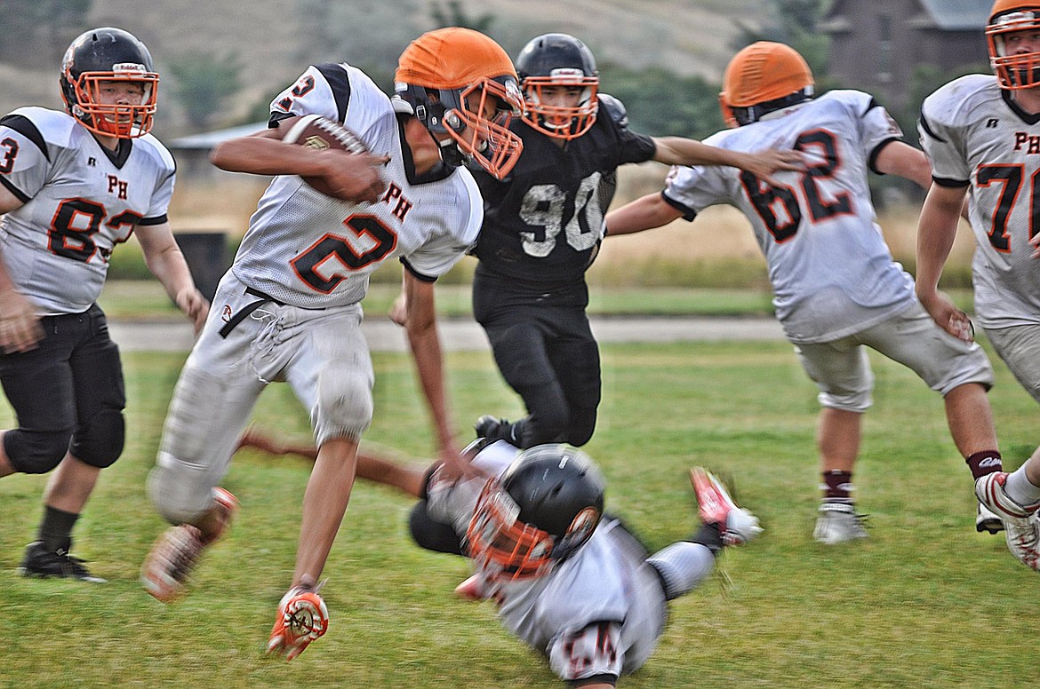 The Horsemen football team takes advantage of an on-field scrimmage. (Photos courtesy of Jessica Peterson)