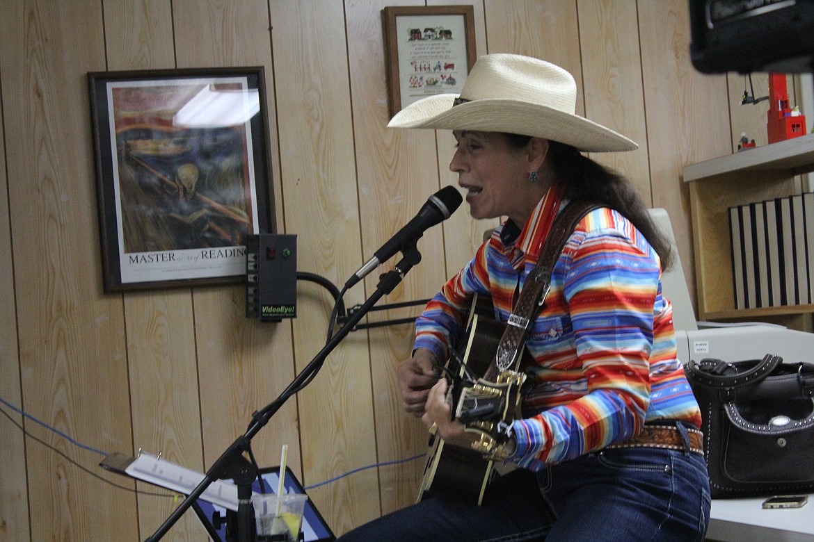 Almeda Bradshaw filled the downstairs portion of the library with her knowledge and songs.