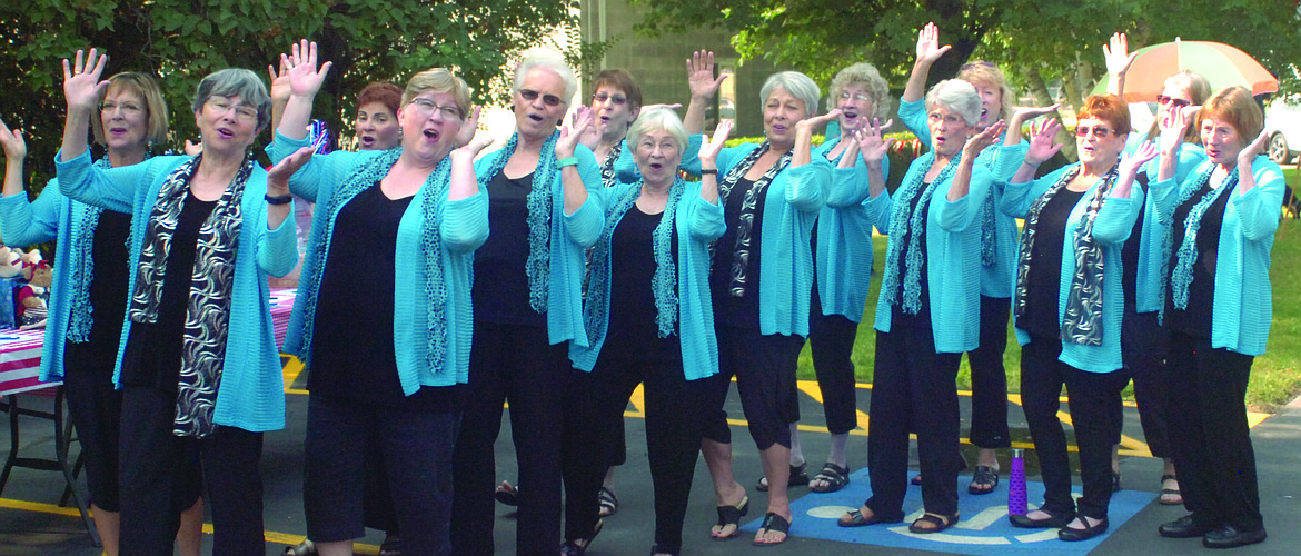 Sweet Adelines from the Five Valley Chorus in Missoula harmonize during a salute to the Plains Library on Saturday. Arlene Kintz of Polson, third from the right in the front row, is an assistant director of the group.