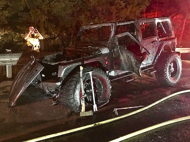 Photo by SHOSHONE COUNTY FIRE DISTRICT NO.1/What is left of the Jeep Wrangler after fire crews extinguished the fire Tuesday night.