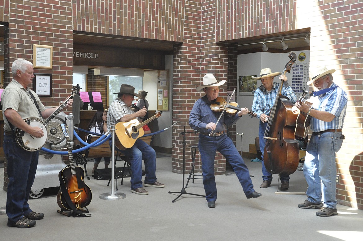 FIVE MEMBERS of The Best of Bannack play at the Lake County Courthouse Friday, Aug. 10, giving the community a preview of their music before they play at The Idle Spur in Dayton for a fundraiser benefitting Dayton Elementary next month. (Ashley Fox/Lake County Leader)