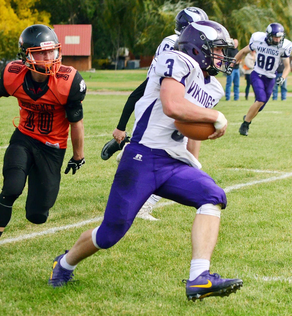 CHARLO QB Landers Smith (3) breaks free from the Plains High School defense in a late September game against Horsemen at Plains High School. Smith, who is one of the most decorated players in the state of Montana in Class C 8-man football, hopes to lead his Vikings to a Montana High School Association Class C 8-man football title. Charlo will open up against Plains at noon Saturday afternoon at Plains High School. (Erin Jusseaume/Valley Press)