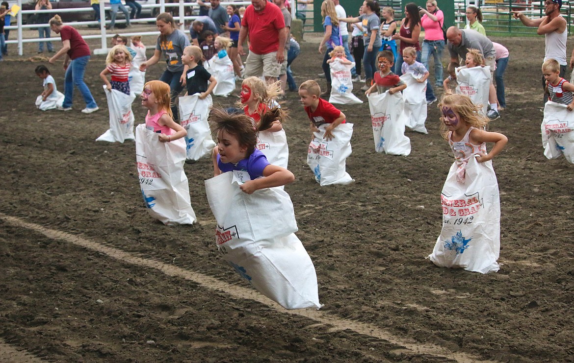 Photo by MANDI BATEMAN
Sack Race hoppers during the Family Fun Night.