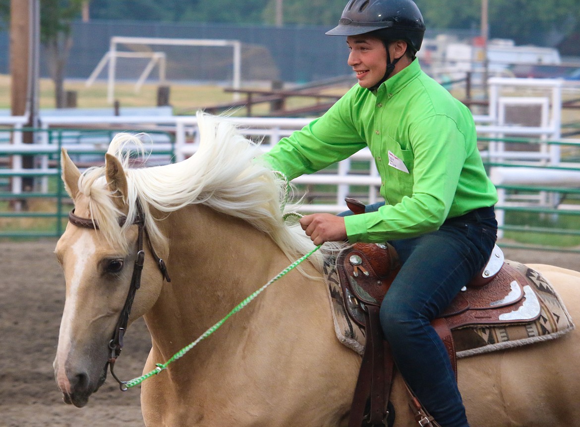 Photo by MANDI BATEMAN
Austin Jones-Stuber and horse, Wendy, head for home.