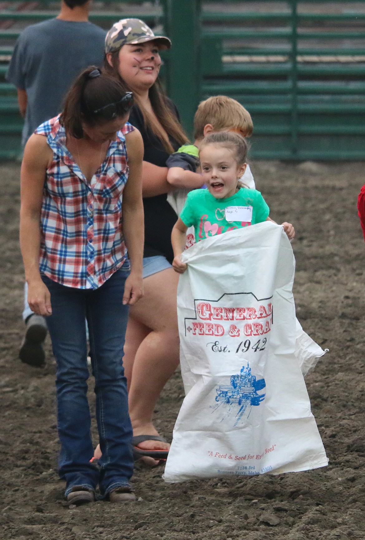 Photo by MANDI BATEMAN
Sack Race competitor can barely contain her excitement.